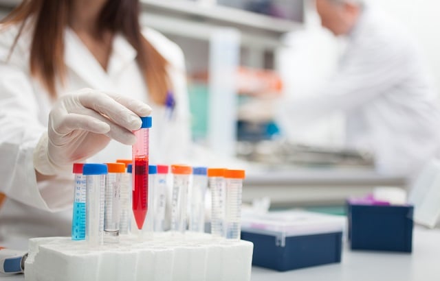 A researcher works in a lab