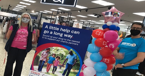 Tesco staff supporting the health charity partnership instore