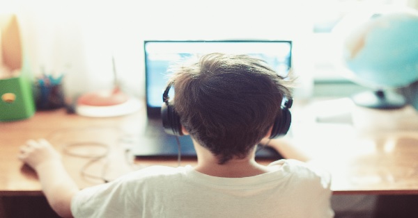 Child using a laptop computer