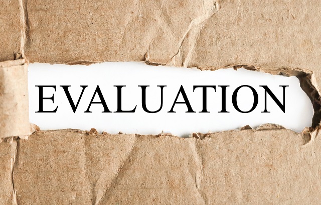 Evaluation text revealed by torn paper