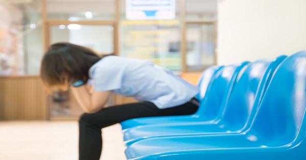 A woman in a medical waiting room