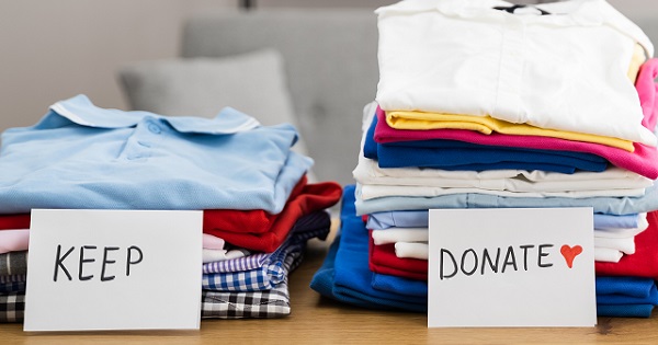 Piles of clothes to donate and keep