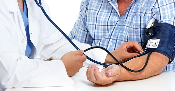 Patient having blood pressure measured