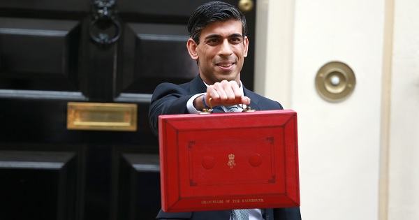 Rishi Sunak holding the red Budget briefcase