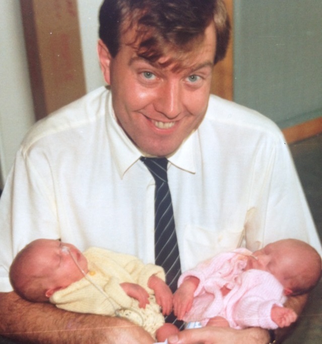 Mac Twins with their father