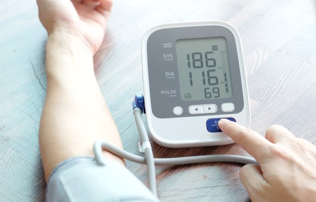 Man measuring his blood pressure.