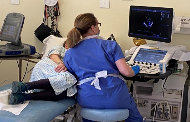 Researchers carry out an echocardiogram on patient Anne Dixon to assess the pumping function of her heart.