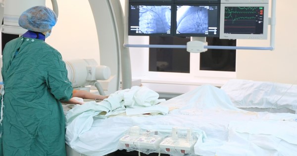 Surgeons performing open heart surgery