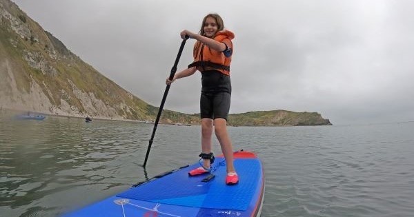 Lucy paddleboarding