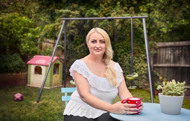 Heart failure patient Alexandra Ellis sitting in her garden holding a mug
