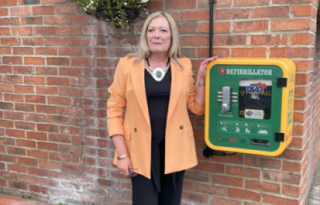 Pam Shurmer with defibrillator