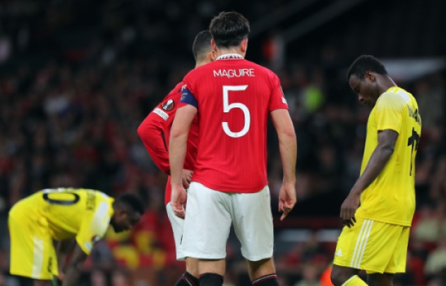 Harry Maguire wearing his Manchester United shirt on the pitch.