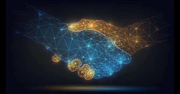 A futuristic image of a handshake, representing a partnership. The hands are made up of points of light that look like stars, with lines connecting them.