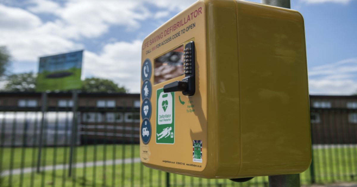 Defibrillator outside school.