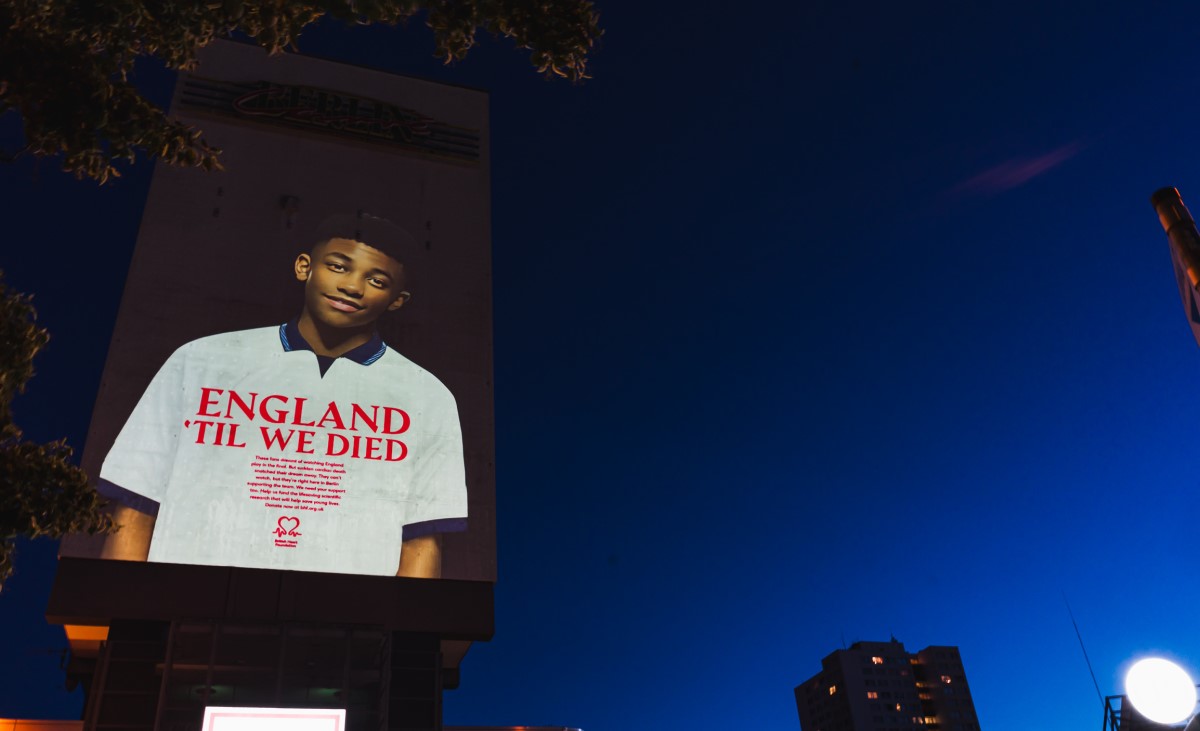 A projection of Myles Christie on a building in Berlin