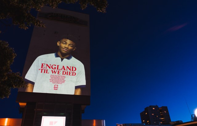 A projection of a young England fan who died from sudden cardiac death