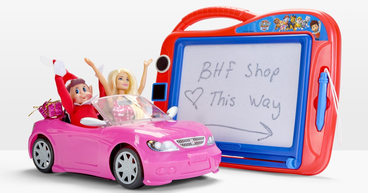 Santa's Elf and Barbie in a pink car