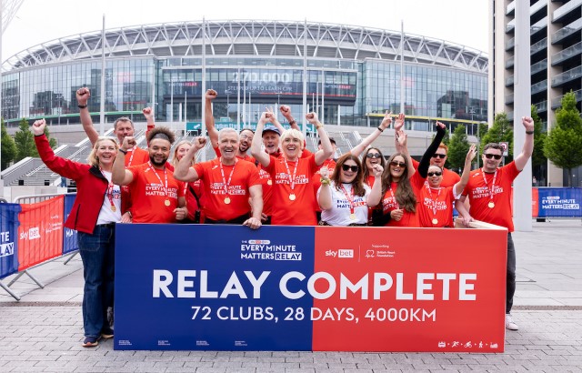 Football legend Graeme Souness and comedian Maisie Adams are joined by BHF and Sky Bet colleagues celebrating the final of the Every Minute Matters Relay outside Wembley Stadium.