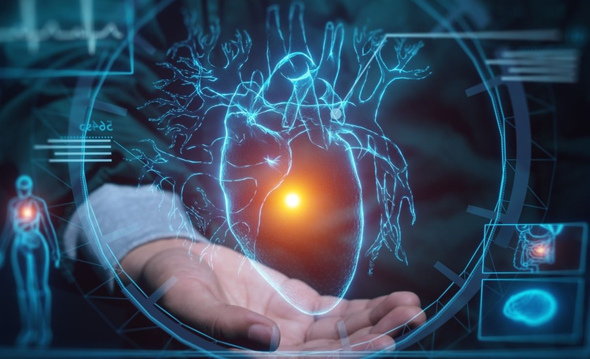Hand holding a hologram of a heart