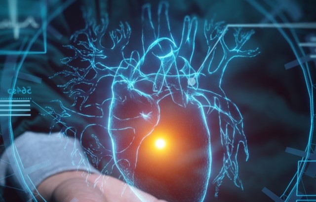 Hand holding a hologram of a heart