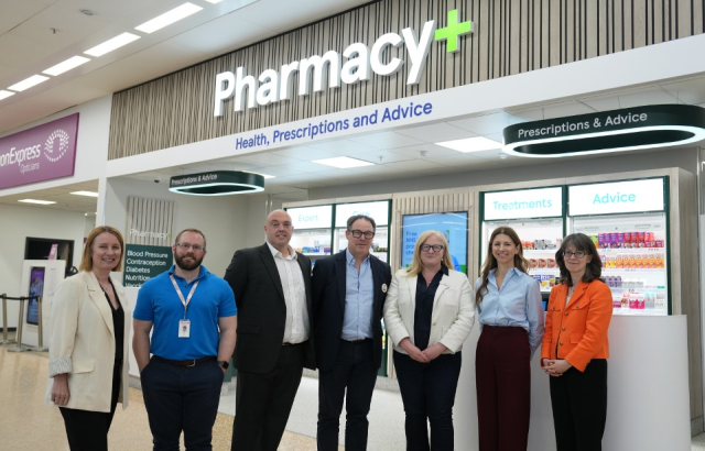 Image of Tesco and BHF staff outside a Tesco Pharmacy site