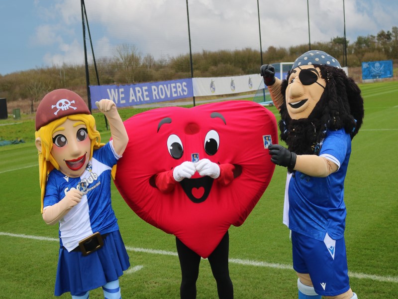 Picture of Bristol Rover's mascots and Hearty with Tom Lockyer's special edition panini card 