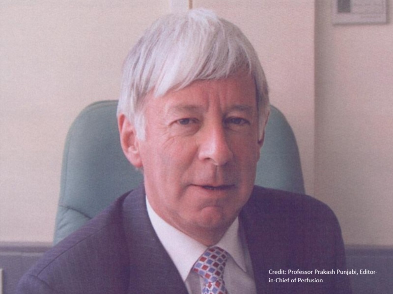 Head shot of Professor Ken Taylor, sitting in an office chair