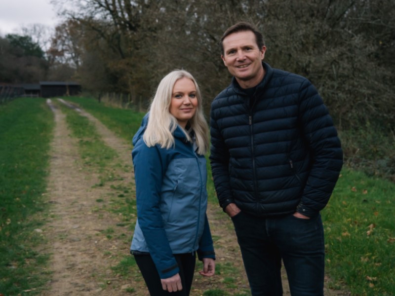 images of Laura Jones and Roger Black walking in the countryside 