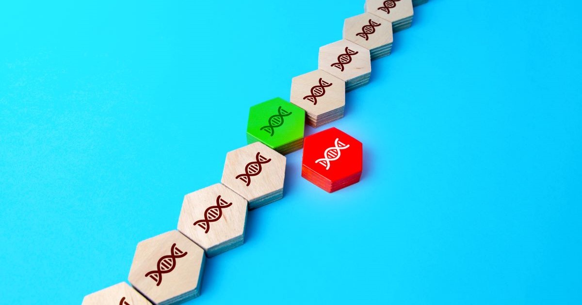 Hexagonal tiles with DNA symbols on a blue background. One tile is green and another is red among beige tiles.