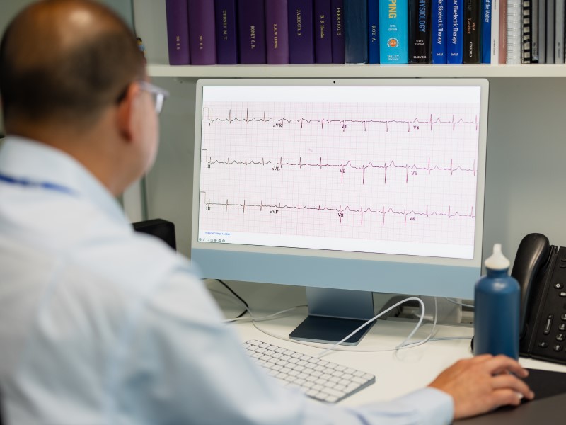 Looking over Dr Ng's shoulder as he looks at an ECG recording on a computer screen