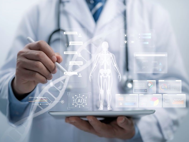Doctor in a lab coat holding a tablet with various AI holograms coming out of it