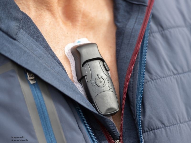 Image of a wearable heart monitor on a man's bare chest