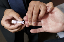 Man having a blood glucose meter test