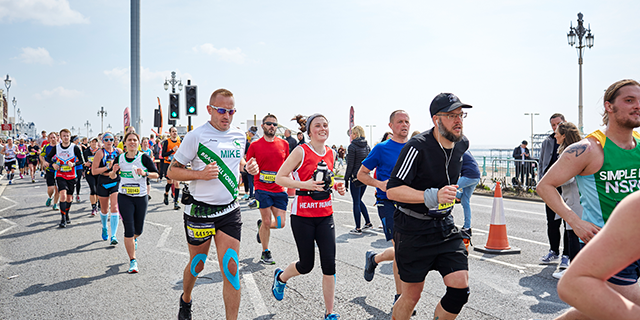 Group of runners on the seafront 