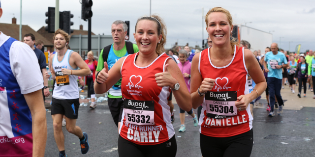 Two BHF runners in Manchester run.